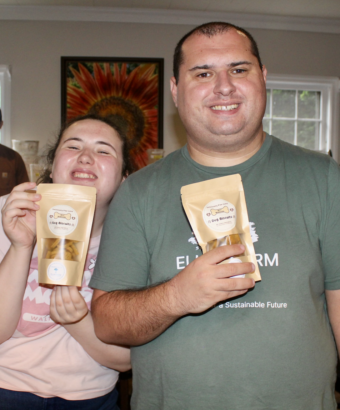 Jason And Katie With Dog Biscuit Packages